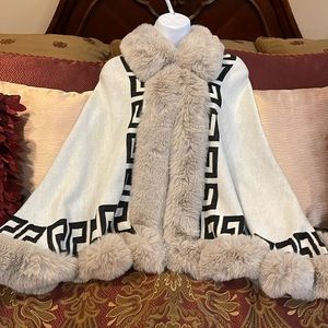 Ladies faux fur cape one size fits most off white/black/tan NWOT price is firm